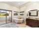 Elegant bathroom with a clawfoot tub, double vanity, and access to a private balcony at 15419 E Stardust Dr, Fountain Hills, AZ 85268