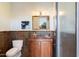 Small bathroom with a toilet, sink, and shower, featuring earth-toned tile at 15419 E Stardust Dr, Fountain Hills, AZ 85268