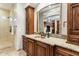 Bathroom with granite countertop, copper sink, and large mirror at 15419 E Stardust Dr, Fountain Hills, AZ 85268