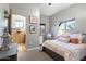 Bedroom with ensuite bathroom and a cozy sitting area at 15419 E Stardust Dr, Fountain Hills, AZ 85268