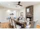 Elegant dining room featuring a stone fireplace and hardwood floors at 15419 E Stardust Dr, Fountain Hills, AZ 85268