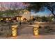 Elegant home with landscaped walkway, lighting, and desert landscaping at 15419 E Stardust Dr, Fountain Hills, AZ 85268