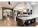 Open concept kitchen with island, custom cabinetry, and stone accents at 15419 E Stardust Dr, Fountain Hills, AZ 85268