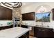 Modern kitchen with double oven, white countertops, and ample storage at 15419 E Stardust Dr, Fountain Hills, AZ 85268