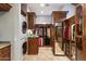 Large laundry room with washer, dryer, and ample storage at 15419 E Stardust Dr, Fountain Hills, AZ 85268