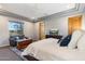 Bright main bedroom with sitting area and ensuite bathroom at 15419 E Stardust Dr, Fountain Hills, AZ 85268