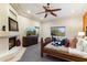 Large main bedroom with fireplace, king-size bed and en-suite bathroom at 15419 E Stardust Dr, Fountain Hills, AZ 85268