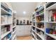 Well-organized pantry with ample shelving at 15419 E Stardust Dr, Fountain Hills, AZ 85268