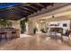 Outdoor patio with seating area, a bar, and pergola, extending the living space at 15419 E Stardust Dr, Fountain Hills, AZ 85268
