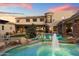 Luxury home with a stunning pool, fountain, and expansive backyard patio at 15419 E Stardust Dr, Fountain Hills, AZ 85268