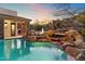 Inviting pool with a cascading waterfall feature at 15419 E Stardust Dr, Fountain Hills, AZ 85268
