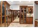 Spacious walk-in closet with custom built-ins and shelving at 15419 E Stardust Dr, Fountain Hills, AZ 85268