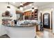 Curved home bar with wine storage and coffee station at 15419 E Stardust Dr, Fountain Hills, AZ 85268