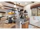 Home wet bar with granite countertop and wood cabinets at 15419 E Stardust Dr, Fountain Hills, AZ 85268