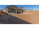 Large backyard with patio, providing ample space for outdoor enjoyment at 21615 N Daniel Dr, Maricopa, AZ 85138