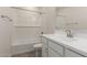 Clean bathroom with white subway tile and vanity at 21615 N Daniel Dr, Maricopa, AZ 85138