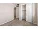 Bright bedroom with carpet and a closet at 21615 N Daniel Dr, Maricopa, AZ 85138