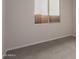 Bright bedroom with neutral walls and carpet at 21615 N Daniel Dr, Maricopa, AZ 85138