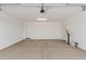 Spacious two car garage with white walls at 21615 N Daniel Dr, Maricopa, AZ 85138