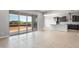Spacious living area with sliding glass doors that provide ample natural light and backyard access at 24691 N 169Th Ave, Surprise, AZ 85387