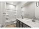 This is a bathroom with double sinks, large mirrors, and a shower and tub at 24707 N 169Th Ave, Surprise, AZ 85387