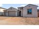 Charming single-Gathering home featuring a neutral-colored exterior, tile roof, and attached two-car garage at 24707 N 169Th Ave, Surprise, AZ 85387