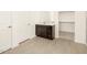 Bathroom with dark brown vanity and walk-in closet at 2625 E Santa Ynez Dr, Casa Grande, AZ 85194