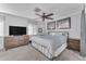 Main bedroom with a large bed and plenty of dresser space at 2727 N 20Th Dr, Phoenix, AZ 85009