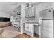 Bedroom with kitchenette and a comfortable bed at 2727 N 20Th Dr, Phoenix, AZ 85009
