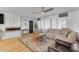 Living room featuring a modern fireplace and comfy seating at 2727 N 20Th Dr, Phoenix, AZ 85009
