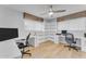 Home office with built-in shelving and two desks at 2727 N 20Th Dr, Phoenix, AZ 85009