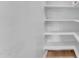 Bright white pantry with ample shelving for storage at 2727 N 20Th Dr, Phoenix, AZ 85009