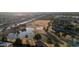 Aerial view showing house, pool, and surrounding park-like setting at 2804 W Curry St, Chandler, AZ 85224