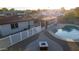 Beautiful backyard featuring a sparkling pool, cozy fire pit, and well-maintained landscaping for perfect outdoor living at 2804 W Curry St, Chandler, AZ 85224