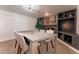 Bright dining room with built-in shelving and fireplace at 2804 W Curry St, Chandler, AZ 85224