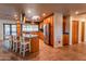 Spacious kitchen with wood cabinets, granite island, and stainless steel appliances at 2804 W Curry St, Chandler, AZ 85224