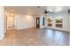 Spacious open-plan living room with tile floors, natural lighting, and an open concept at 2804 W Curry St, Chandler, AZ 85224