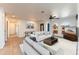 Bright living room boasts tile floors, neutral walls, and ample natural light from arched windows at 2804 W Curry St, Chandler, AZ 85224