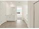 Well-lit bathroom featuring tile flooring, a soaking tub, shower, and vanity with ample space at 37013 W La Paz St, Maricopa, AZ 85138