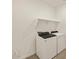 Convenient laundry room equipped with a modern washer and dryer set at 37013 W La Paz St, Maricopa, AZ 85138