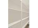 Open shelving pantry with white shelves at 37013 W La Paz St, Maricopa, AZ 85138