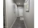 Clean hallway with sleek flooring and neutral paint at 1406 W Main St # 140, Mesa, AZ 85201