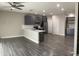 Stylish kitchen with gray cabinets, stainless steel appliances, and an open layout at 1406 W Main St # 140, Mesa, AZ 85201