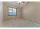 Cozy bedroom with carpet, a window with blinds, neutral tones and an electrical outlet at 14430 N Prickly Pear Ct, Fountain Hills, AZ 85268