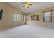 Spacious bedroom featuring a ceiling fan, vaulted ceiling, and plenty of natural light at 14430 N Prickly Pear Ct, Fountain Hills, AZ 85268