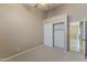 Bright bedroom features neutral walls, carpet, ceiling fan and closet space at 14430 N Prickly Pear Ct, Fountain Hills, AZ 85268