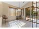 Dining area featuring a hanging light fixture, wine rack, and a sliding glass door to the backyard at 14430 N Prickly Pear Ct, Fountain Hills, AZ 85268
