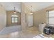 Inviting foyer with tile flooring, natural light, and open access to living areas at 14430 N Prickly Pear Ct, Fountain Hills, AZ 85268
