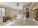 Spacious living room featuring tile flooring, high ceilings, and ample natural light at 14430 N Prickly Pear Ct, Fountain Hills, AZ 85268