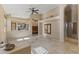 Bright living area with tile flooring, large windows, and an open layout to the kitchen at 14430 N Prickly Pear Ct, Fountain Hills, AZ 85268